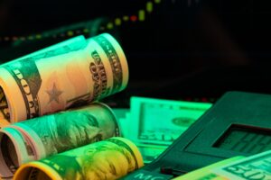 Dollar notes and forex chart showing liquidity in managed accounts.
