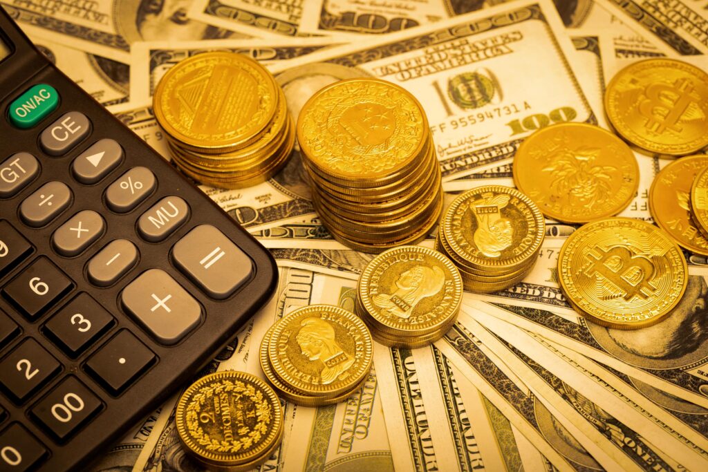 Coins, cash, and calculator for micro accounts in forex.