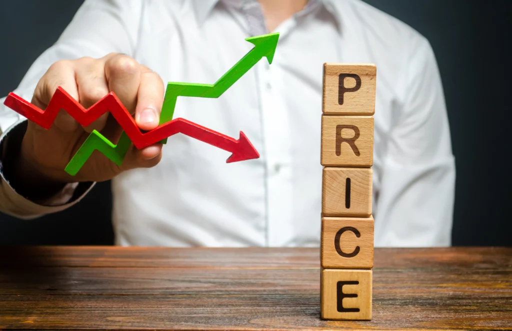 Forex trading image showing green and red arrows and wooden blocks spelling "PRICE" to represent price changes and trends.