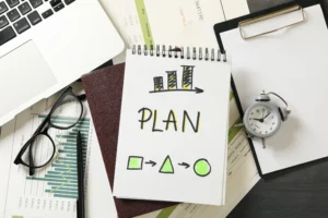 Daily vs. Weekly Forex Trading Plans notebook with charts and planning tools.