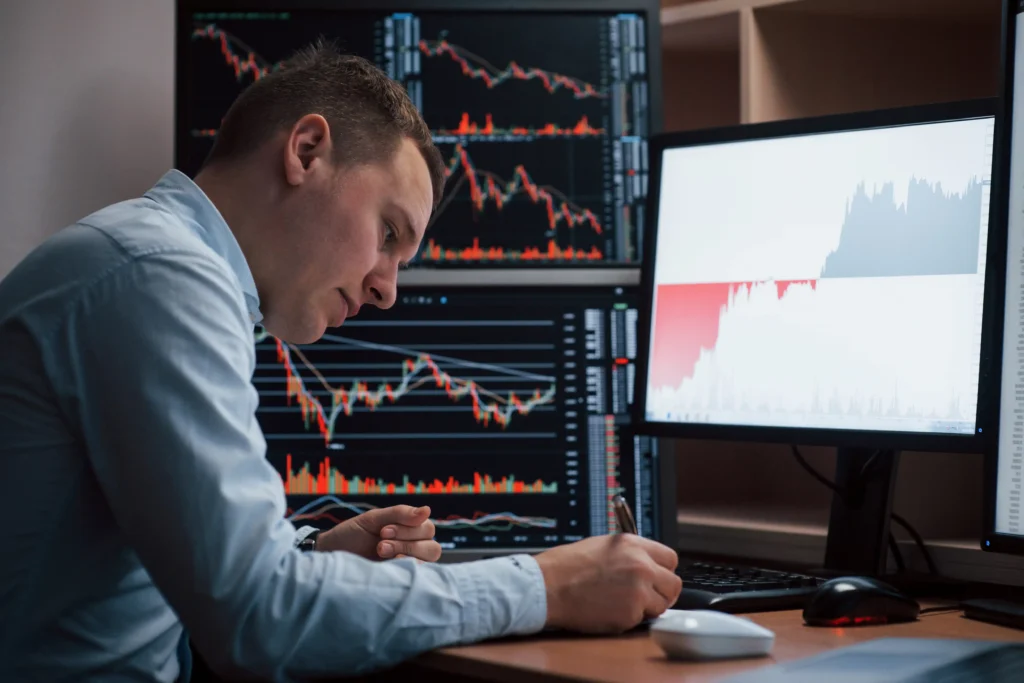 Trader analyzing live market charts for order decisions.