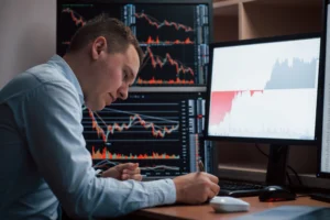 Trader analyzing live market charts for order decisions.