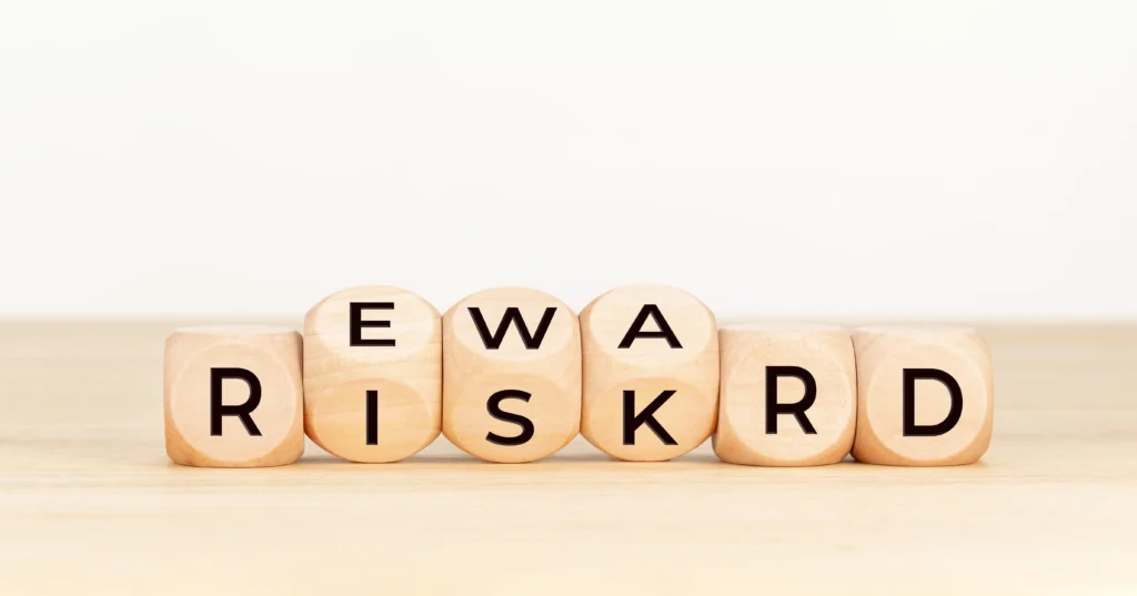 Improving risk to reward ratio with wooden blocks symbolizing balanced forex trading strategy and profit growth in 2025.