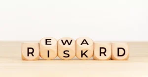 Improving risk to reward ratio with wooden blocks symbolizing balanced forex trading strategy and profit growth in 2025.
