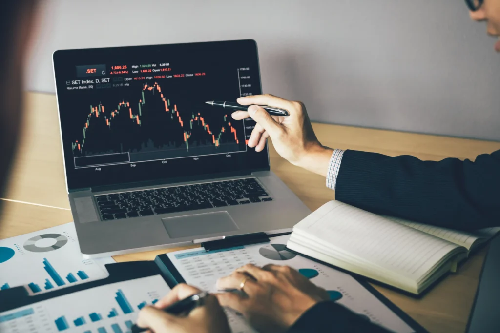 Scalping strategies being discussed by traders analyzing charts and financial reports for profitable short-term market opportunities.