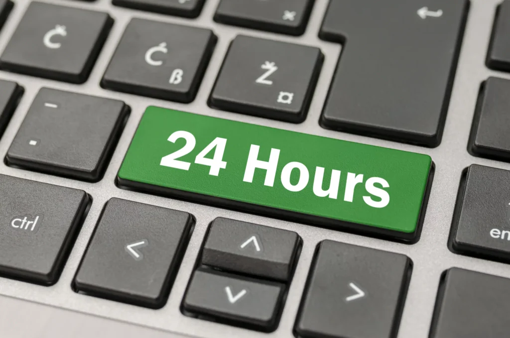Green 24 Hours key on a computer keyboard symbolizing nonstop trading access