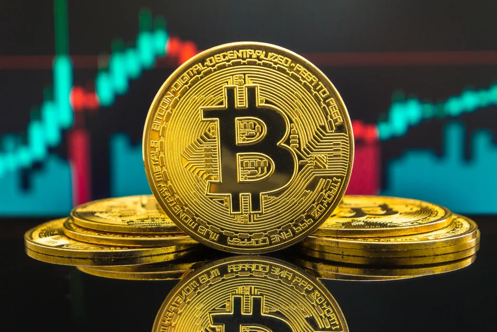 Golden Bitcoin coin with forex trading chart in background
