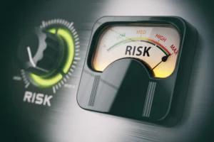 ATR Stop-Loss Strategies for Risk Control in 2025 illustrated with a trading risk meter showing low to high levels.