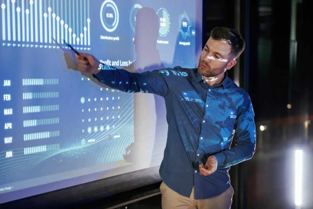 Trader explaining MACD Divergence Chart Patterns with graphs and profit statistics on screen in 2025