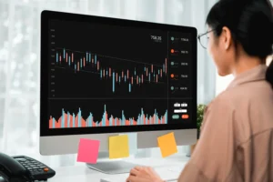 Trader using Up/Down Volume Indicator on candlestick chart.