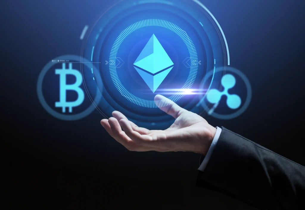 Hand holding digital crypto icons symbolizing Tokenization of Real-World Assets.