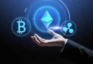 Hand holding digital crypto icons symbolizing Tokenization of Real-World Assets.