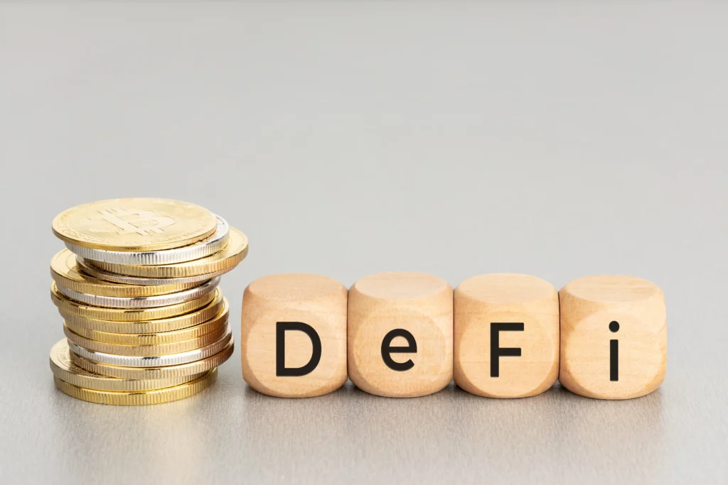 Decentralized Finance (DeFi) concept with stacked coins and wooden blocks