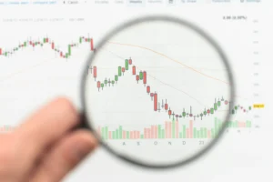 Heikin-Ashi Candlestick chart showing smoothed price trend under magnifying glass.