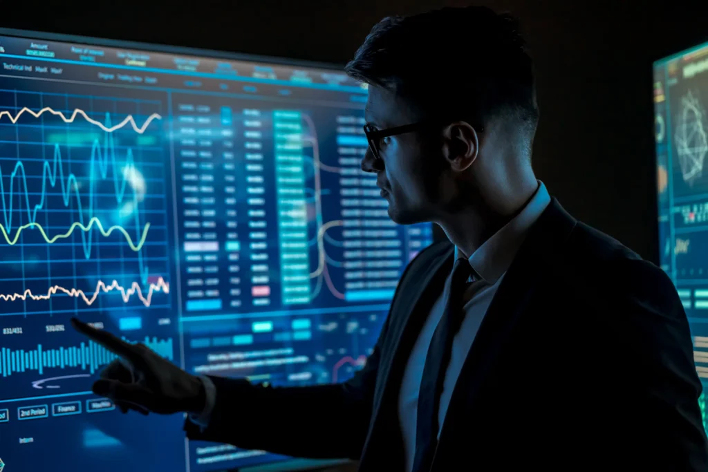 Trader analyzing charts using Delta Hedging Automation software.