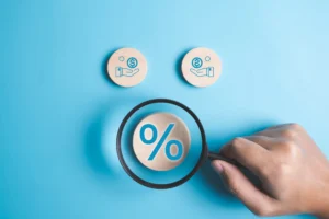 Magnifying glass highlighting a percentage symbol surrounded by financial icons representing interest rate swap concepts.