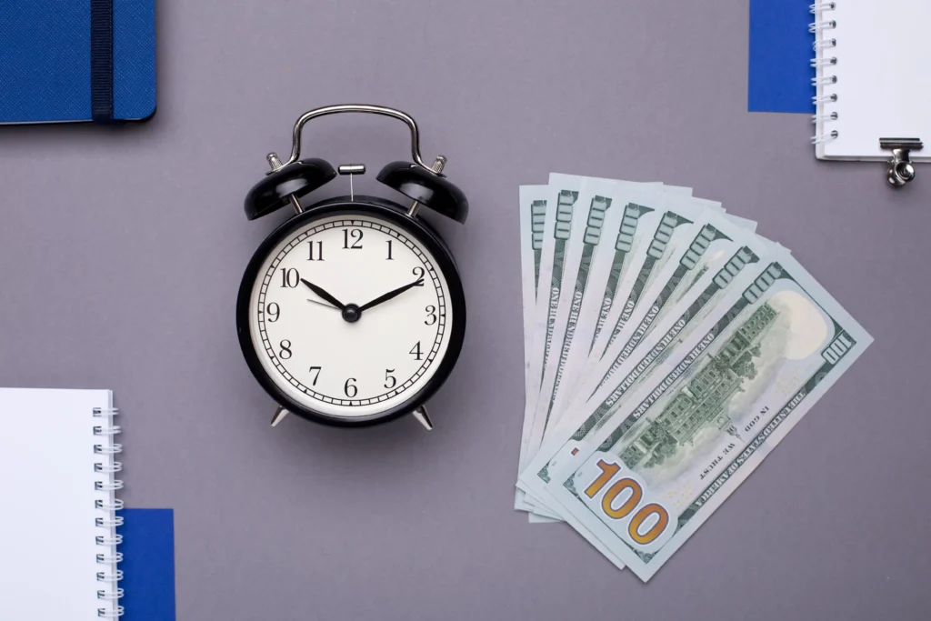 Clock with dollar bills representing Time-Weighted Average Price execution over time