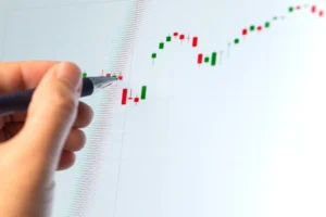 Trader analyzing candlestick chart pattern showing potential Hanging Man reversal signal.